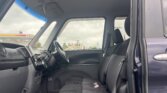 Front passenger area of Daihatsu Tanto with upholstery details
