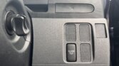 Driver-side window and mirror control panel of Daihatsu Tanto